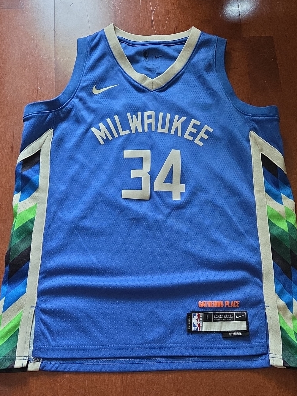 Nike Blue Milwaukee 34 Basketball Jersey with Multicolor Chevron Sides